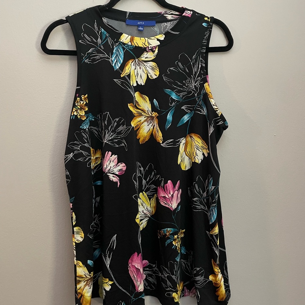 Floral tank top. Like New! Soft and comfortable. Polyester, spandex- size large